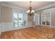 Formal dining room featuring hardwood floors and wainscoting at 205 Micah Ln # 33, Iron Station, NC 28080