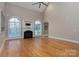 Spacious living room featuring hardwood floors and a fireplace at 205 Micah Ln # 33, Iron Station, NC 28080