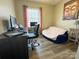 Bedroom with a workspace, window coverings, and a beanbag chair at 206 King Henry Ln, Gastonia, NC 28056