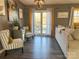 Living room with French doors leading to a deck at 206 King Henry Ln, Gastonia, NC 28056