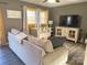 Cozy living room with gray walls and hardwood floors at 206 King Henry Ln, Gastonia, NC 28056