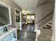 Open living space with hardwood floors and gray walls at 206 King Henry Ln, Gastonia, NC 28056