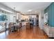 Modern kitchen with white cabinets, stainless steel appliances, and an island at 21711 Shoveller Ct, Cornelius, NC 28031