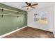 Bedroom with wood floors and green accent wall at 2221 Franklin St, Rock Hill, SC 29732