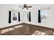 Bedroom with hardwood floors and three windows at 2221 Franklin St, Rock Hill, SC 29732