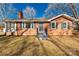 Charming brick house featuring a covered porch at 2221 Franklin St, Rock Hill, SC 29732