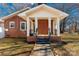 Brick facade with a covered porch and walkway leading to the entrance at 2221 Franklin St, Rock Hill, SC 29732