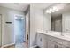 Bathroom with double vanity, large mirror, and shower at 2224 Apple Glen Ln, Charlotte, NC 28269