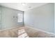 Cozy bedroom with neutral walls and carpet flooring at 2224 Apple Glen Ln, Charlotte, NC 28269