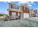 Two-story brick house with a covered porch and attached garage at 2224 Apple Glen Ln, Charlotte, NC 28269