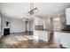 Open concept kitchen with granite countertops and stainless steel appliances at 2224 Apple Glen Ln, Charlotte, NC 28269