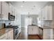 Modern kitchen featuring stainless steel appliances and granite countertops at 2224 Apple Glen Ln, Charlotte, NC 28269