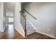 Elegant staircase with wood and metal detailing at 2224 Apple Glen Ln, Charlotte, NC 28269