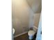 Small powder room with a pedestal sink and toilet at 2255 Transatlantic Ave, Charlotte, NC 28215