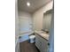 Bathroom with granite countertop, tub, and neutral flooring at 2255 Transatlantic Ave, Charlotte, NC 28215