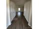 Bright entryway with wood-look flooring leading to the living room at 2255 Transatlantic Ave, Charlotte, NC 28215