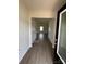 Bright entryway with wood-look flooring leading to the living room at 2255 Transatlantic Ave, Charlotte, NC 28215