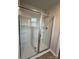 Clean shower with multiple shelves and sliding glass door at 2255 Transatlantic Ave, Charlotte, NC 28215