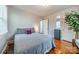 Cozy bedroom with hardwood floors and a charming window at 2516 Columbus Cir, Charlotte, NC 28208