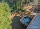 Aerial view of a backyard deck with table and chairs at 2516 Columbus Cir, Charlotte, NC 28208