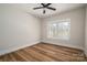 Bright bedroom with wood-look floors and large window at 2572 Maiden-Salem Road Maiden Salem Rd # 4, Lincolnton, NC 28092