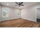 Spacious bedroom with wood-look floors and two windows at 2572 Maiden-Salem Road Maiden Salem Rd # 4, Lincolnton, NC 28092