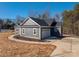 Gray house exterior with white trim, landscaping, and a curved walkway at 2572 Maiden-Salem Road Maiden Salem Rd # 4, Lincolnton, NC 28092