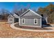 Gray house exterior with white trim, landscaping, and a curved walkway at 2572 Maiden-Salem Road Maiden Salem Rd # 4, Lincolnton, NC 28092