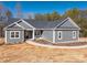 Gray house exterior with white trim, landscaping, and a curved walkway at 2572 Maiden-Salem Road Maiden Salem Rd # 4, Lincolnton, NC 28092