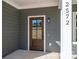 Dark brown front door with glass panes and gray exterior at 2572 Maiden-Salem Road Maiden Salem Rd # 4, Lincolnton, NC 28092