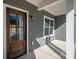 Dark brown front door with glass panes and gray exterior at 2572 Maiden-Salem Road Maiden Salem Rd # 4, Lincolnton, NC 28092