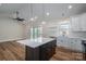 Open concept kitchen with island and white shaker cabinets at 2572 Maiden-Salem Road Maiden Salem Rd # 4, Lincolnton, NC 28092