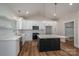 Modern kitchen with white cabinets, quartz countertops and large island at 2572 Maiden-Salem Road Maiden Salem Rd # 4, Lincolnton, NC 28092