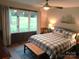 Comfortable bedroom with large window and nautical decor at 2579 Ranger Island Rd, Denver, NC 28037