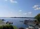 Stunning view of the lake with multiple boats and docks at 2579 Ranger Island Rd, Denver, NC 28037