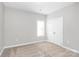 Neutral bedroom with carpeted floors, white trim and doors, and a single window at 2820 Rosemeade Dr, Monroe, NC 28110