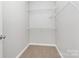 Walk-in closet with wire shelving for ample storage at 2820 Rosemeade Dr, Monroe, NC 28110