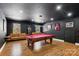 Game room with pool table and leather sofas at 2943 Tallgrass Blf, Rock Hill, SC 29732