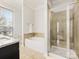 Bathroom with soaking tub and walk-in shower at 3551 Spencer St, Charlotte, NC 28205