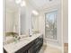 Modern bathroom with double vanity and granite countertop at 3551 Spencer St, Charlotte, NC 28205