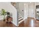 Bright entryway with hardwood floors and staircase at 3551 Spencer St, Charlotte, NC 28205