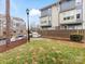 Landscaped yard with walkway leading to the townhome entrance at 3551 Spencer St, Charlotte, NC 28205