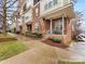 Townhome entrance with brick facade and small porch at 3551 Spencer St, Charlotte, NC 28205