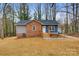 Charming renovated ranch home with brick and blue siding at 3711 Indian Ct, Lenoir, NC 28601