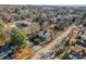 House nestled in a residential neighborhood, seen from above at 410 7Th St, Spencer, NC 28159