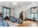 Cozy bedroom with hardwood floors, twin beds, and lots of natural light at 410 7Th St, Spencer, NC 28159