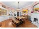 Farmhouse style dining room with wooden table and built-in cabinets at 410 7Th St, Spencer, NC 28159