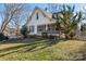 White house with screened porch and large backyard at 410 7Th St, Spencer, NC 28159