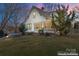 House with screened porch and firepit in the backyard at night at 410 7Th St, Spencer, NC 28159