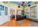 Charming kitchen with hardwood floors and view into dining area at 410 7Th St, Spencer, NC 28159